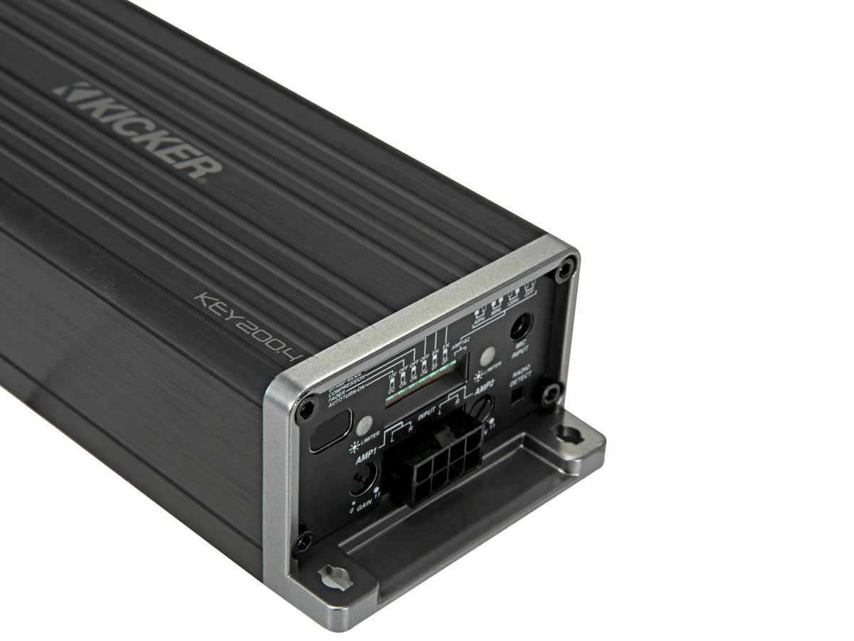 Close-up of KICKER KEY200.4 amplifier tuning controls and input connections